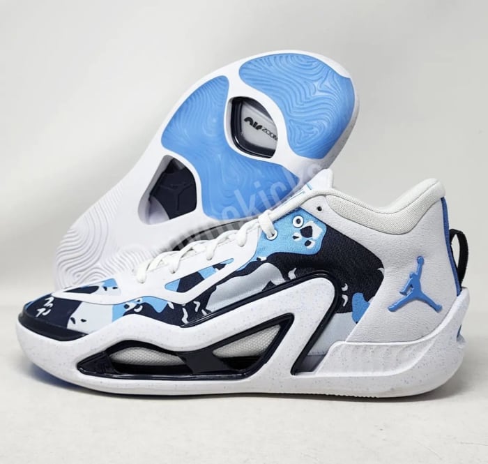 Side view of Jayson Tatum's blue and white Jordan Brand sneakers.